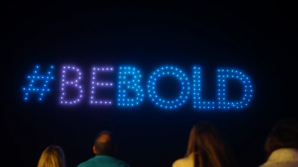 drones formando la palabra Be bold en el cielo